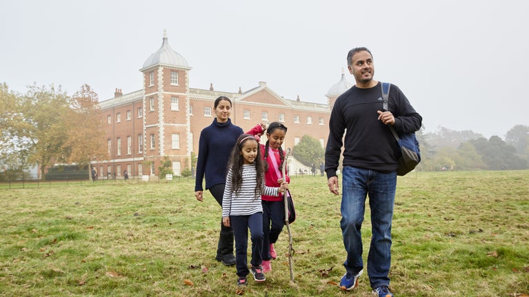 A family walking in the grounds at Osterley Park and House, London
